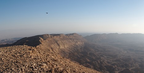 Image showing Rim of desert canyon at sunset