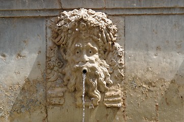 Image showing Funny mascaron face on fountain in Alhambra, Granada, Spain