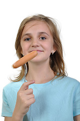 Image showing Young girl with boiled hot dog