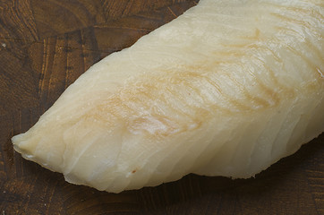 Image showing Raw Cod on a wooden butcher 