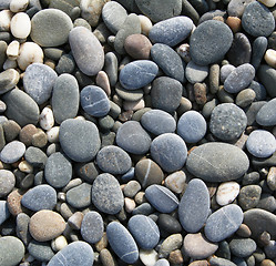 Image showing Grey pebbles on the beach as background 