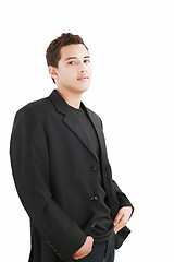 Image showing Happy smiling young man standing isolated on white background