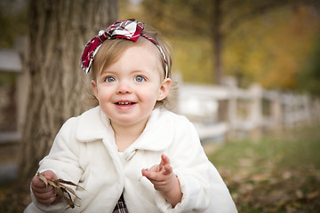 Image showing Adorable Baby Girl Playing in Park