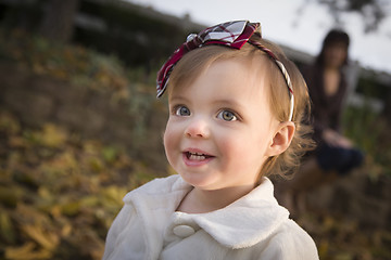 Image showing Adorable Baby Girl Playing in Park with Mom