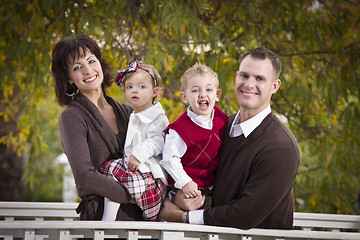 Image showing Young Attractive Parents and Children Portrait in Park