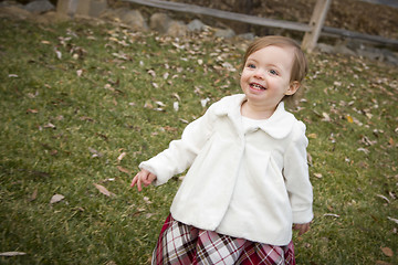 Image showing Adorable Baby Girl Playing in Park