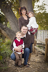 Image showing Young Attractive Parents and Children Portrait in Park