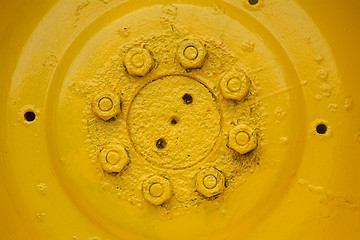 Image showing Detail of old, yellow wheel