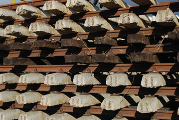 Image showing Rows of concrete and wood cross-tie