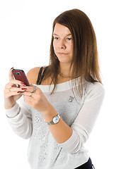 Image showing Pretty woman talking by mobile phone