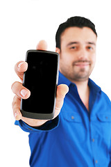 Image showing businessman with cellphone, isolated on white, focus on hand