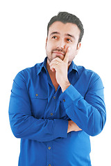 Image showing caucasian man thinking pensive looking up studio portrait on iso