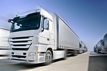 Image showing Modern  Truck on road added motion blur