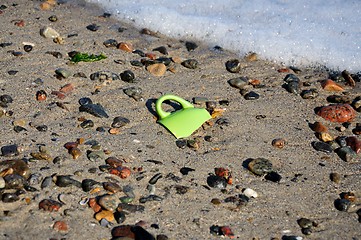 Image showing The broken coffee cup on seacoast