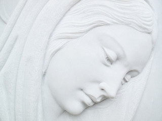 Image showing virgin mary on white marble tombstone