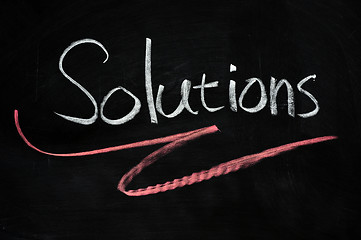 Image showing Solutions written on blackboard