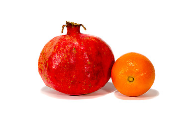 Image showing Garnet and orange isolated on a white background with shadow.