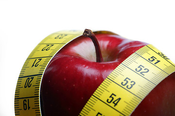 Image showing Red apple with measurement isolated on white 