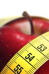 Image showing 	Red apple with measurement isolated on white