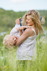 Image showing Playful mother with cute child