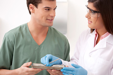 Image showing Dentist with Assistant