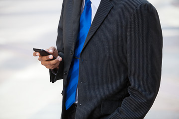 Image showing Businessman using cell phone