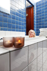 Image showing Beautiful woman in bathtub at luxury spa