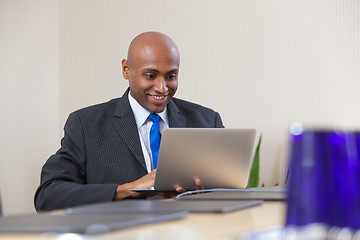 Image showing Businessman working on laptop