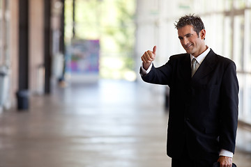 Image showing Businessman Gesturing Thumbs Up