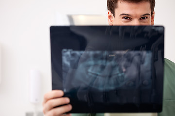 Image showing Young Male Dentist with X-ray