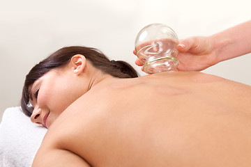 Image showing Relaxed Woman after Fire Cupping