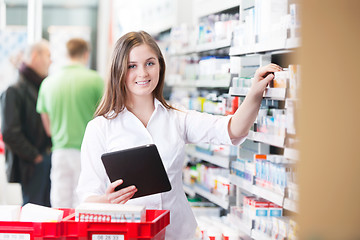 Image showing Female Pharmacist Holding Tablet PC