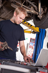 Image showing Auto Mechanic with Laptop