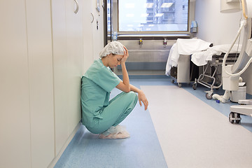 Image showing Tired Doctor in Hospital Hallway