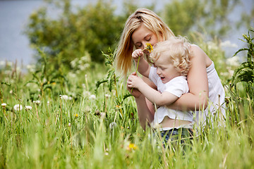 Image showing Mother and Son in Grass Field