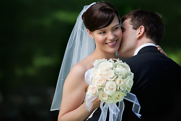Image showing Happy Kiss of Newlyweds
