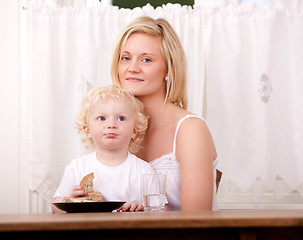 Image showing Mother and Child Eating Meal