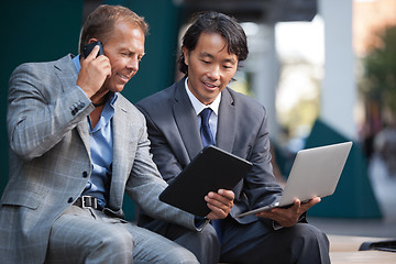 Image showing Businessmen using electronic gadgets