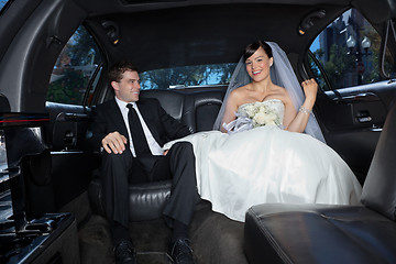 Image showing Happy couple in limousine