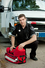 Image showing Paramedic with Portable Oxygen Unit