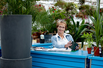 Image showing Senior Worker in Garden Center