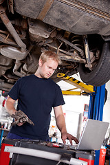 Image showing Mechanic with Laptop