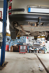 Image showing Car on service lift