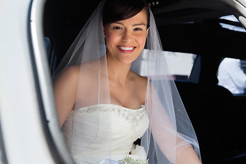 Image showing Happy Bride in Limo