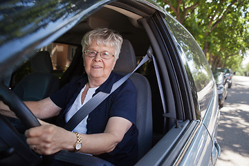 Image showing Old woman driving car