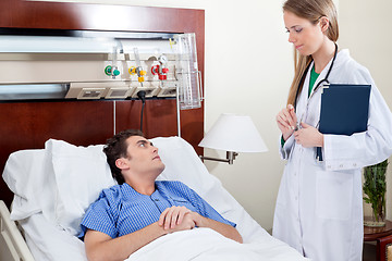 Image showing Patient consulting doctor