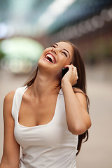 Image showing Cheerful Woman Talking on Cell Phone