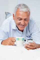 Image showing Man Using Cell Phone