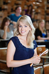 Image showing College Girl Standing in Lecture Hall