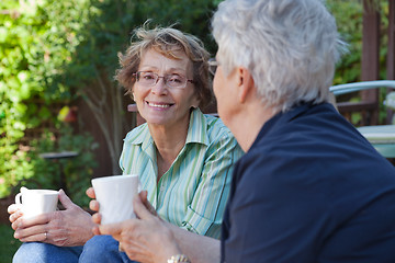 Image showing Senior Women with Warm Drinks
